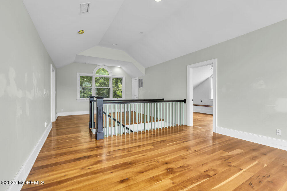 4 Oneida Avenue Atlantic Highlands, NJ 07716 - Photo 40 of 80 a view of a room with wooden floor and a window