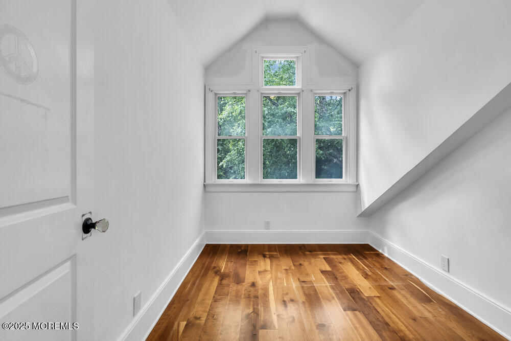 4 Oneida Avenue Atlantic Highlands, NJ 07716 - Photo 45 of 80 a view of a room with wooden floor and balcony