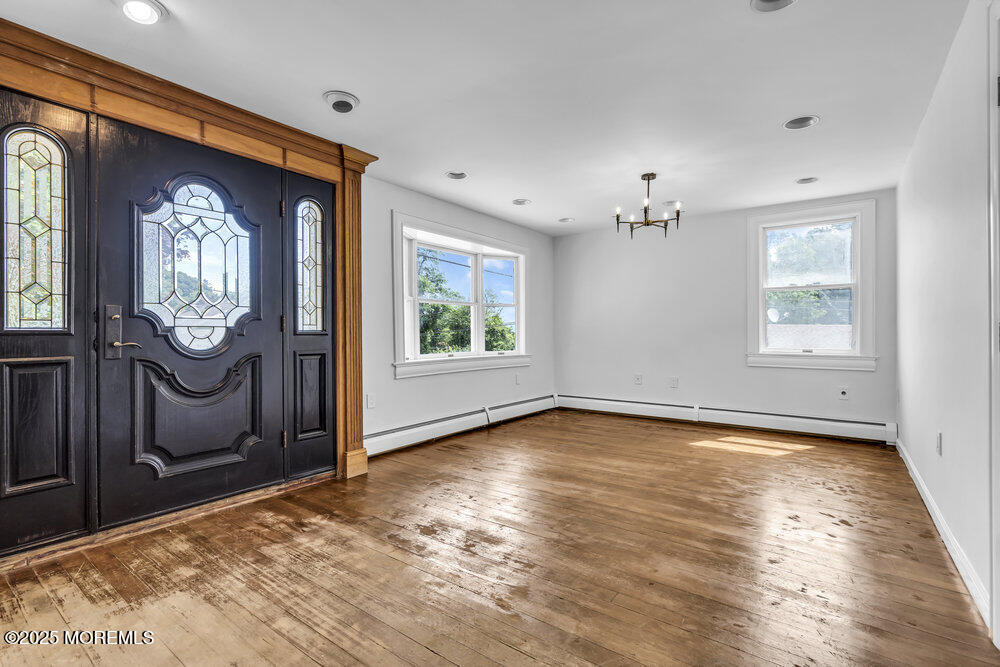 4 Oneida Avenue Atlantic Highlands, NJ 07716 - Photo 6 of 80 a view of a room with wooden floor front door and windows