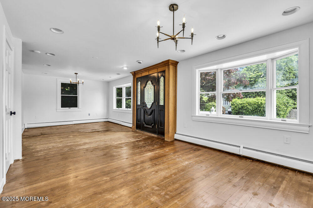 4 Oneida Avenue Atlantic Highlands, NJ 07716 - Photo 80 of 80 a view of an empty room with a window and a kitchen