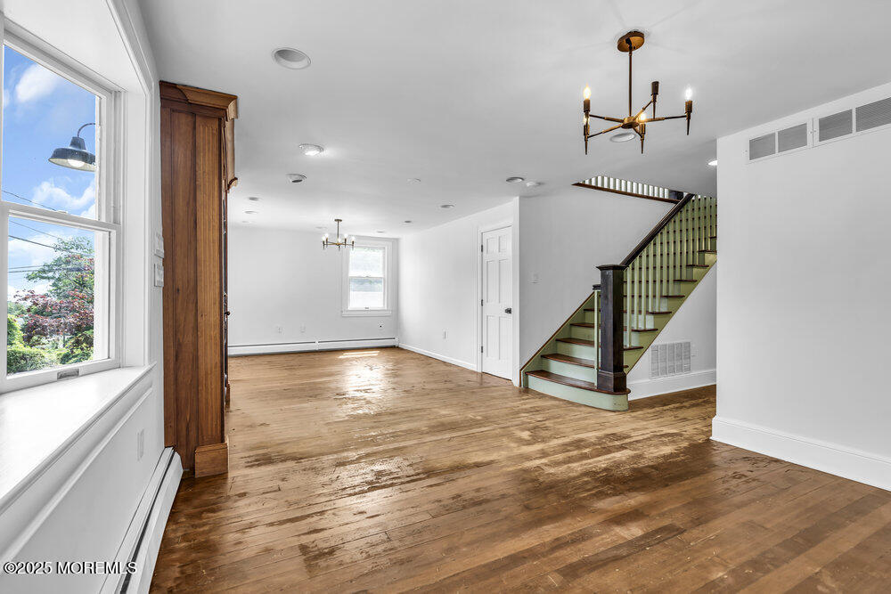 4 Oneida Avenue Atlantic Highlands, NJ 07716 - Photo 7 of 80 a view of an entryway with wooden floor and staircase