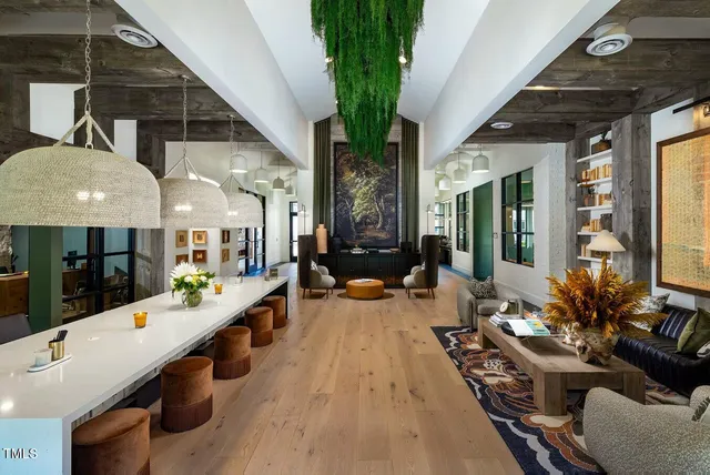 a lobby with furniture and window