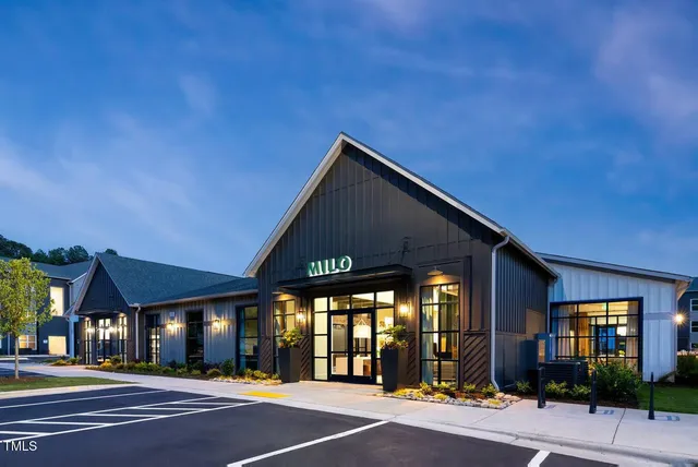 a view of a building with a street