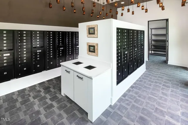 a hallway with cabinets