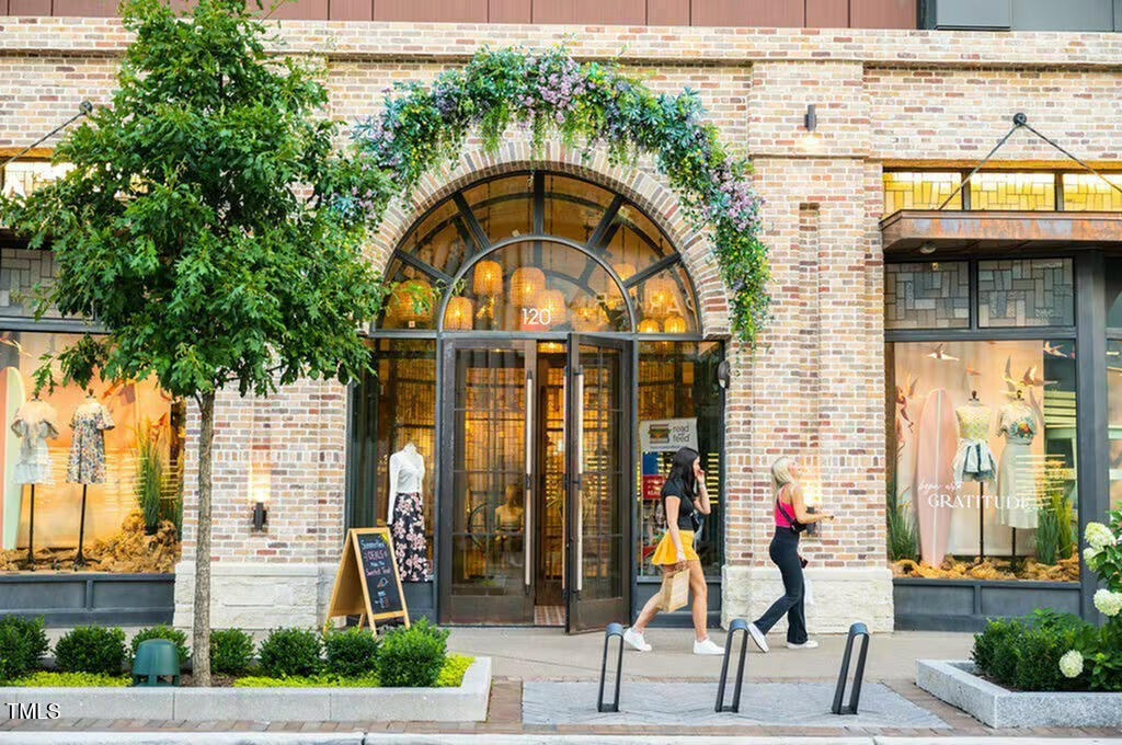821 Hanbury Way, Unit A1 Raleigh, NC 27607 - Photo 43 of 43 a view of building with glass windows and door