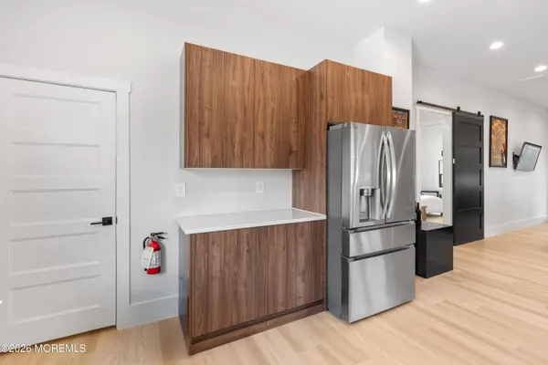 a kitchen with a stove and a microwave