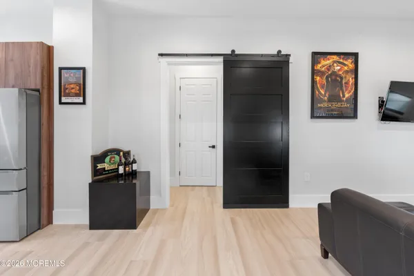 a kitchen with stainless steel appliances granite countertop a refrigerator stove and oven