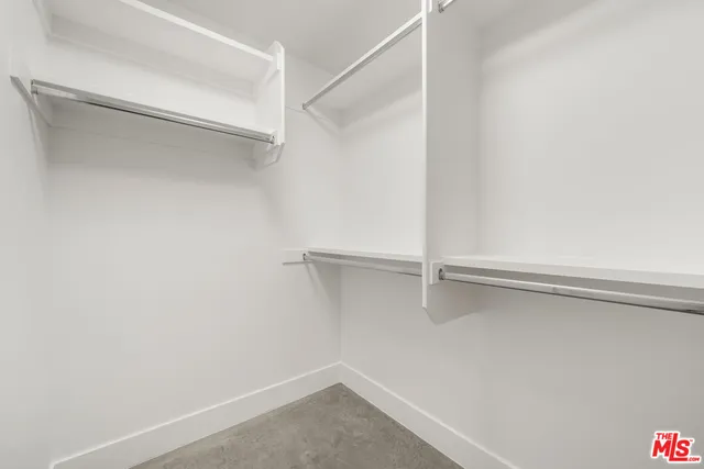 a view of an empty walk in closet