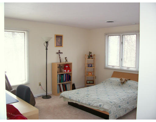 46 Azalea Road Sharon, MA 02067 - Photo 12 of 28 a bedroom with a bed and a window