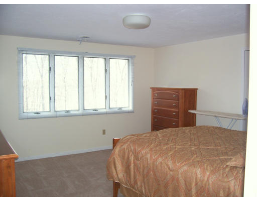 46 Azalea Road Sharon, MA 02067 - Photo 13 of 28 a bedroom with a bed and a window