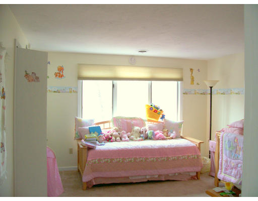 46 Azalea Road Sharon, MA 02067 - Photo 14 of 28 a bedroom with a bed and a window