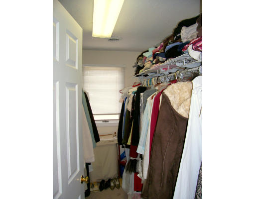 46 Azalea Road Sharon, MA 02067 - Photo 21 of 28 a view of walk in closet with clothes and shoes