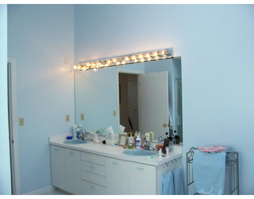 46 Azalea Road Sharon, MA 02067 - Photo 24 of 28 a bathroom with a sink and a mirror