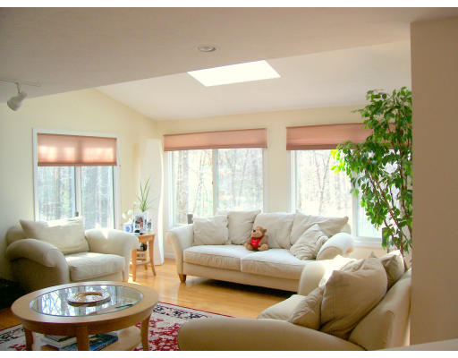 46 Azalea Road Sharon, MA 02067 - Photo 4 of 28 a living room with furniture and a large window