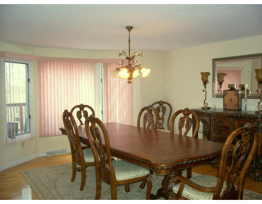 46 Azalea Road Sharon, MA 02067 - Photo 6 of 28 a view of a dining room with furniture and window