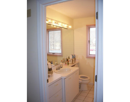 46 Azalea Road Sharon, MA 02067 - Photo 8 of 28 a bathroom with a sink toilet and vanity