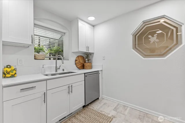 a bathroom with a sink and a vanity