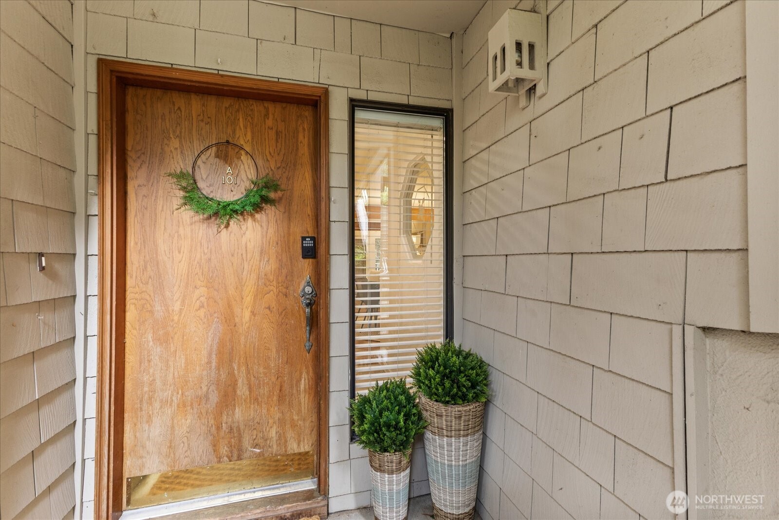 3921 108th Avenue Northeast, Unit A101 Bellevue, WA 98004 - Photo 2 of 27 a glass door with a glass door and shower