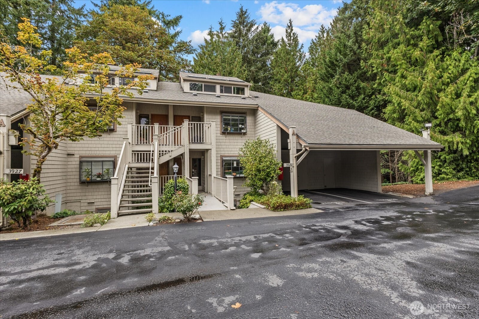 3921 108th Avenue Northeast, Unit A101 Bellevue, WA 98004 - Photo 27 of 27 front view of a house with a street
