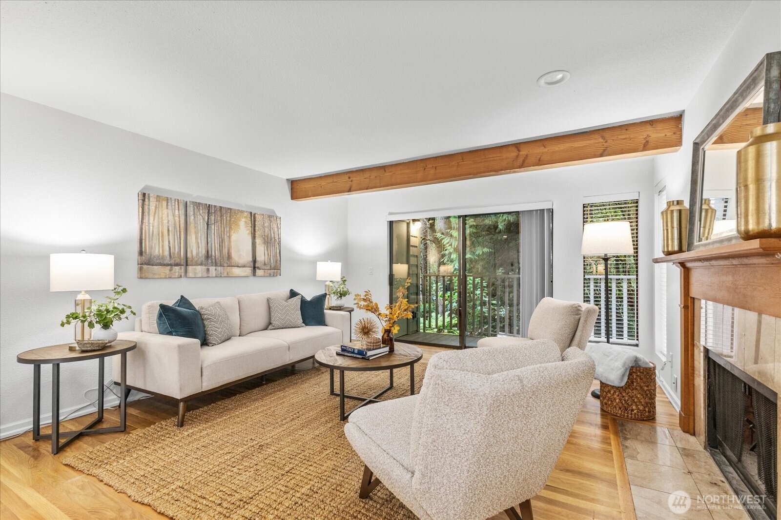 3921 108th Avenue Northeast, Unit A101 Bellevue, WA 98004 - Photo 4 of 27 a living room with furniture and a fireplace