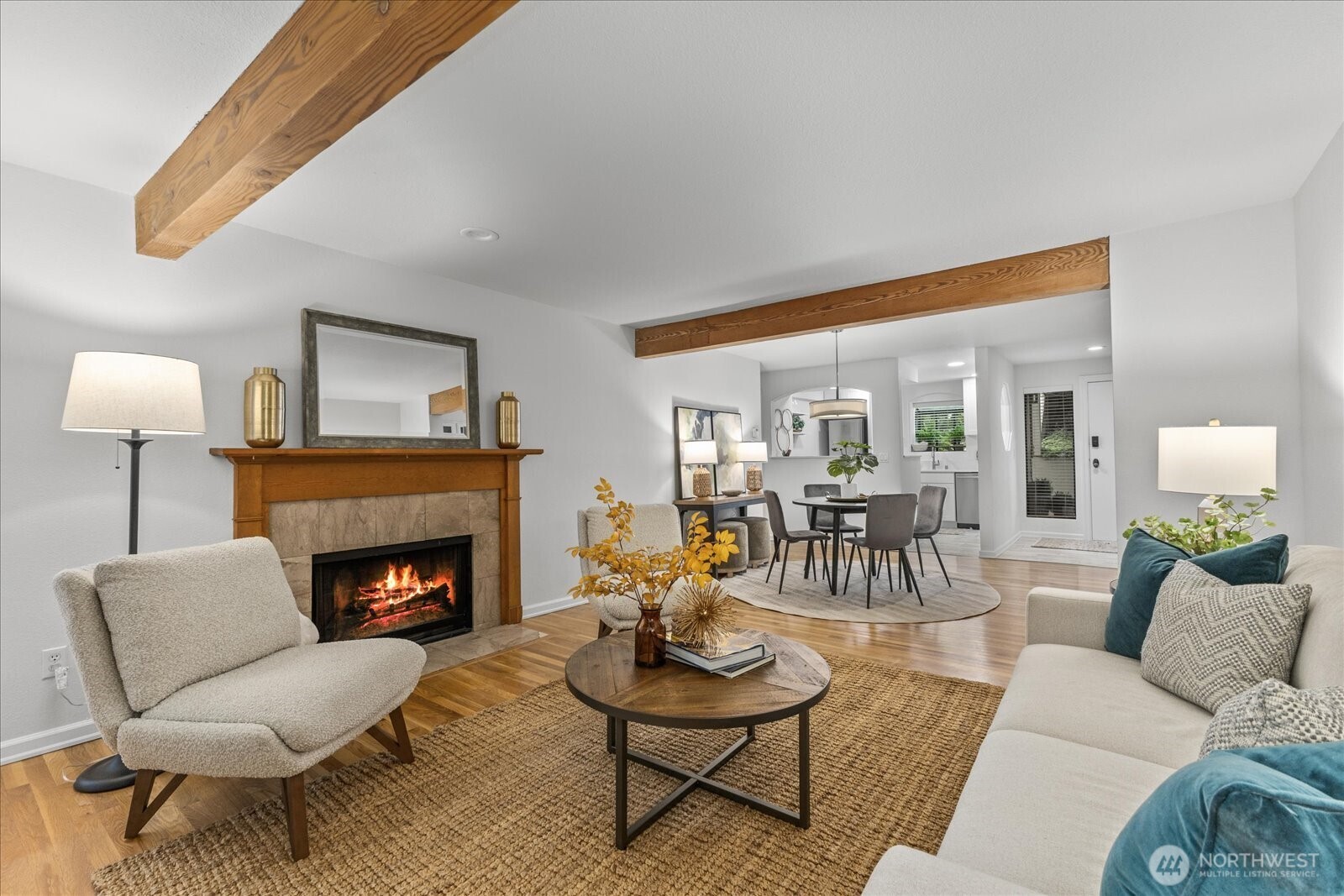 3921 108th Avenue Northeast, Unit A101 Bellevue, WA 98004 - Photo 5 of 27 a living room with furniture and a fireplace