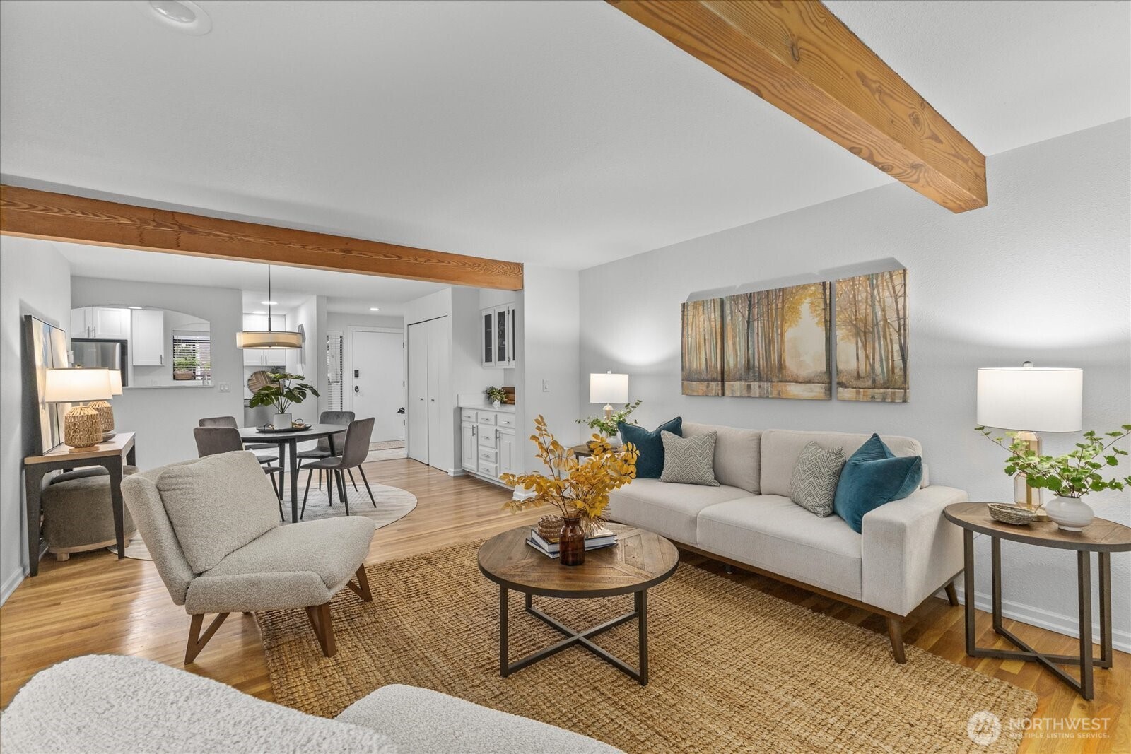 3921 108th Avenue Northeast, Unit A101 Bellevue, WA 98004 - Photo 6 of 27 a living room with furniture and a large window