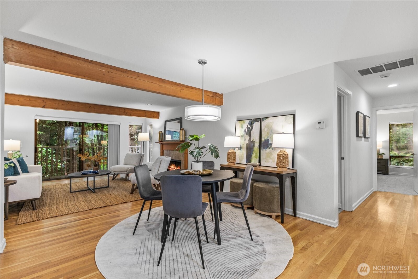 3921 108th Avenue Northeast, Unit A101 Bellevue, WA 98004 - Photo 7 of 27 a view of a dining room with furniture window and outside view