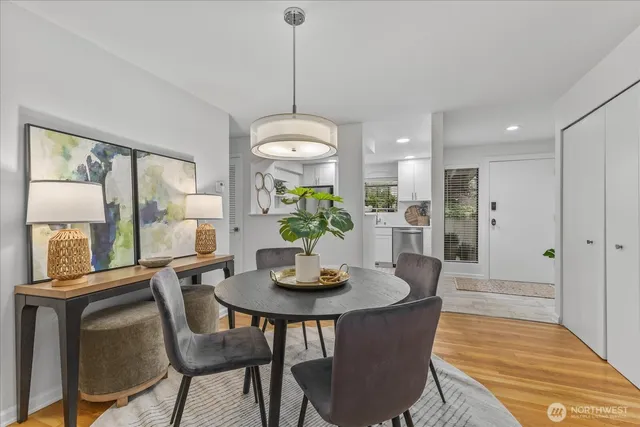 a view of a dining room with furniture window and outside view