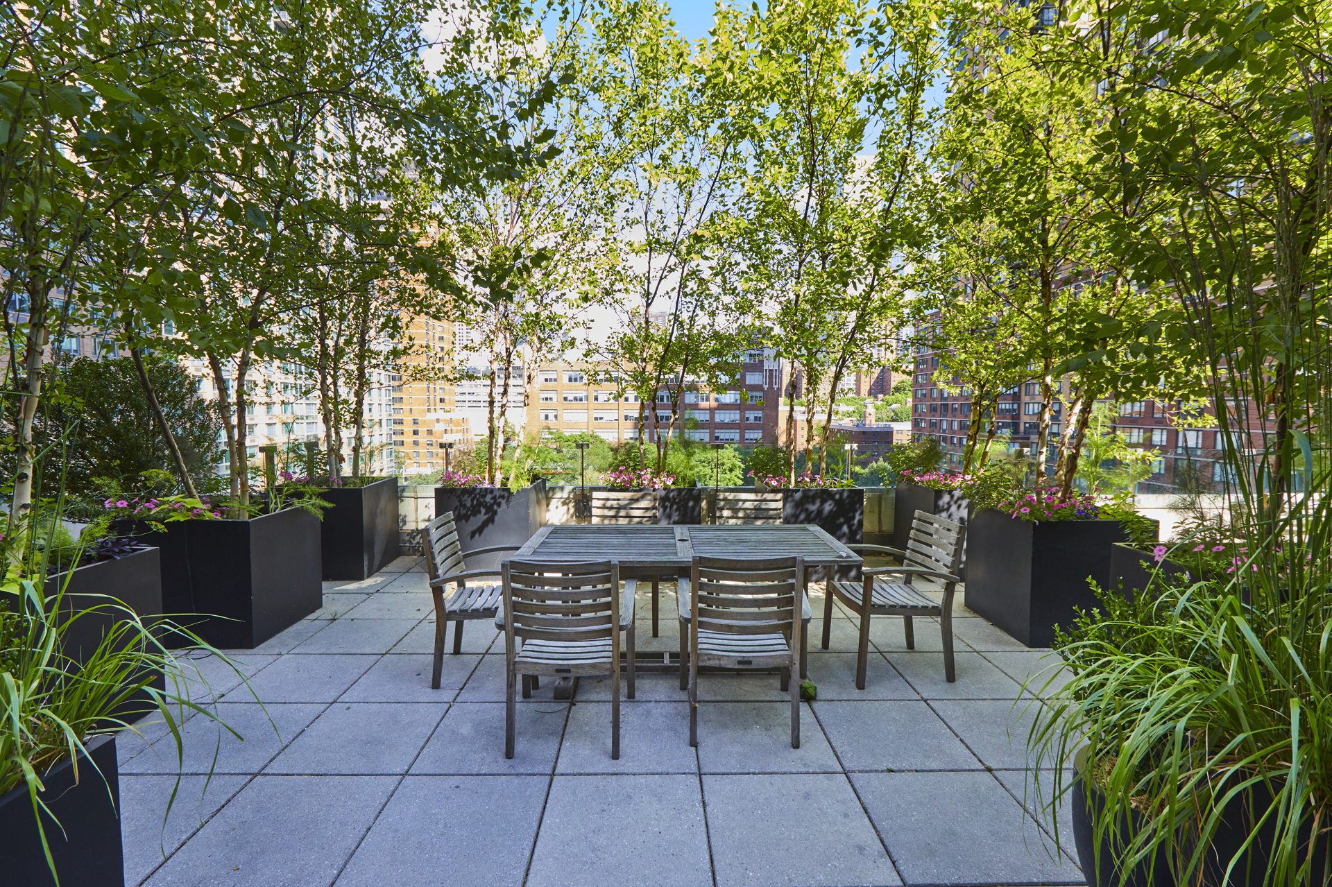 80 Riverside Boulevard, Unit 19B Manhattan, NY 10069 - Photo 16 of 18 a view of a tables and chairs in a patio