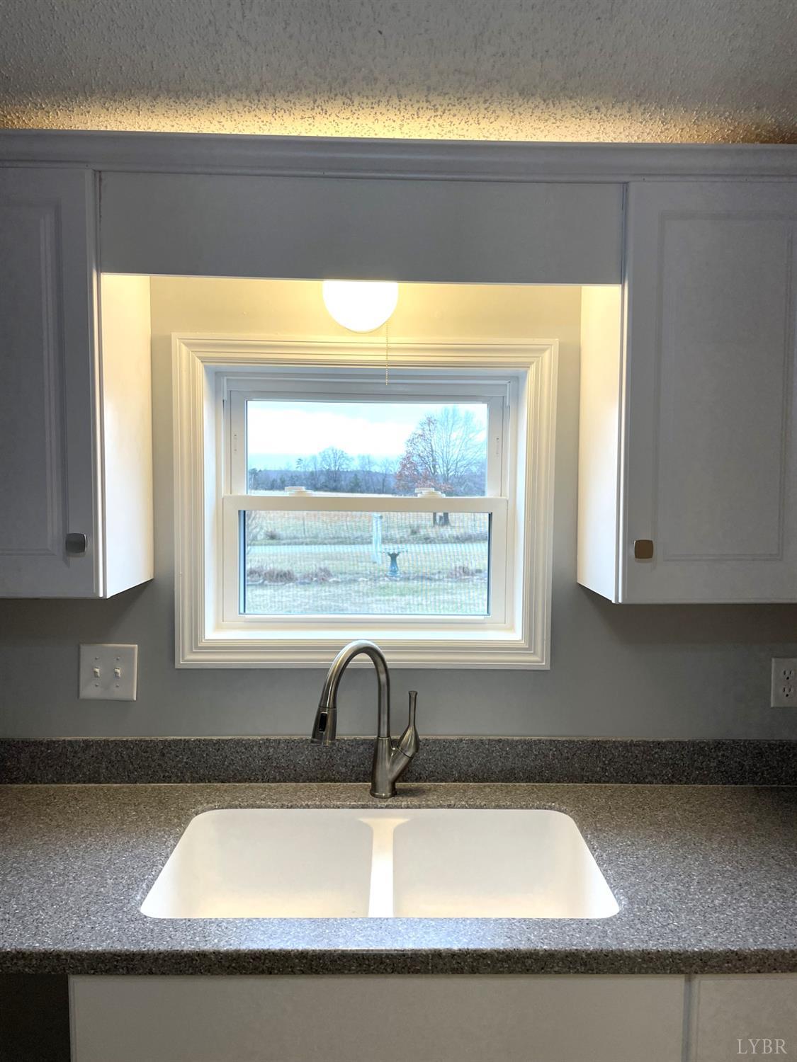 232 Camp Branch Road Gretna, VA 24557 - Photo 16 of 47 a sink with window