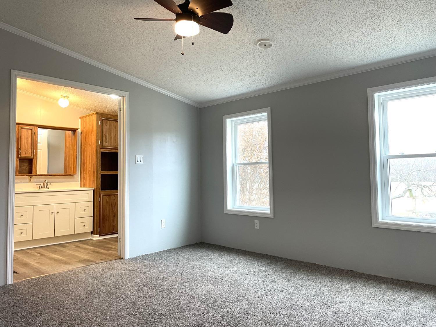 232 Camp Branch Road Gretna, VA 24557 - Photo 23 of 47 a view of an empty room with a window