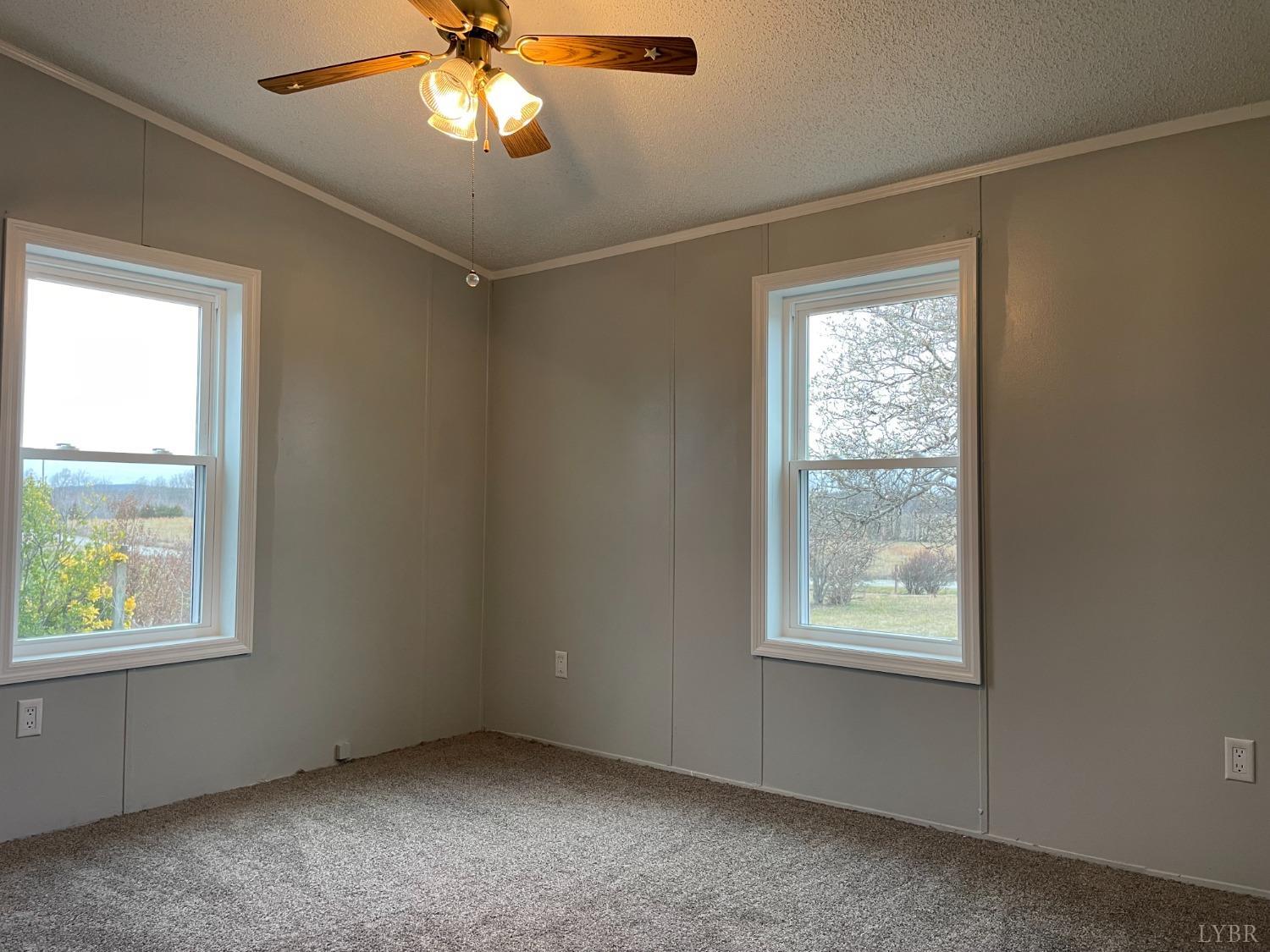232 Camp Branch Road Gretna, VA 24557 - Photo 29 of 47 an empty room with a window