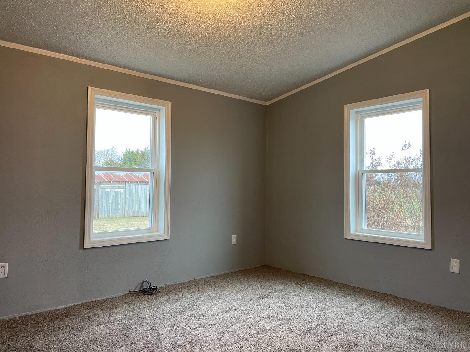 232 Camp Branch Road Gretna, VA 24557 - Photo 34 of 47 an empty room with windows