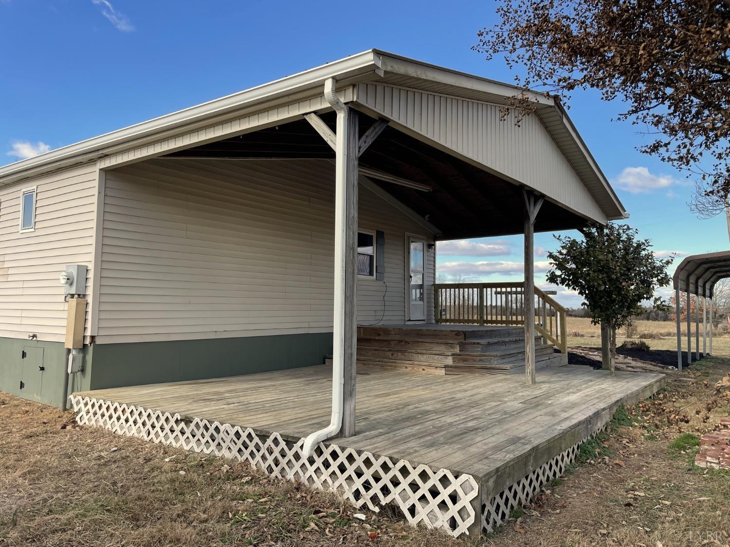 232 Camp Branch Road Gretna, VA 24557 - Photo 36 of 47 a view of a house with a yard