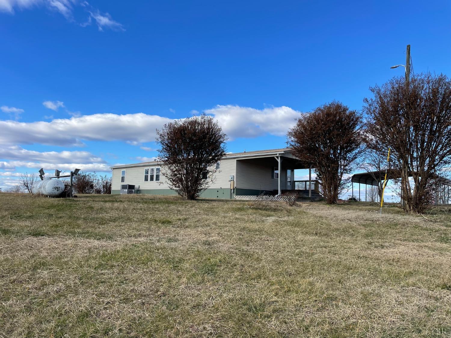 232 Camp Branch Road Gretna, VA 24557 - Photo 37 of 47 a view of a house with a yard