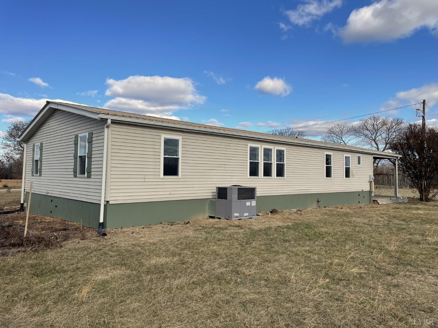 232 Camp Branch Road Gretna, VA 24557 - Photo 38 of 47 a view of a house with a backyard