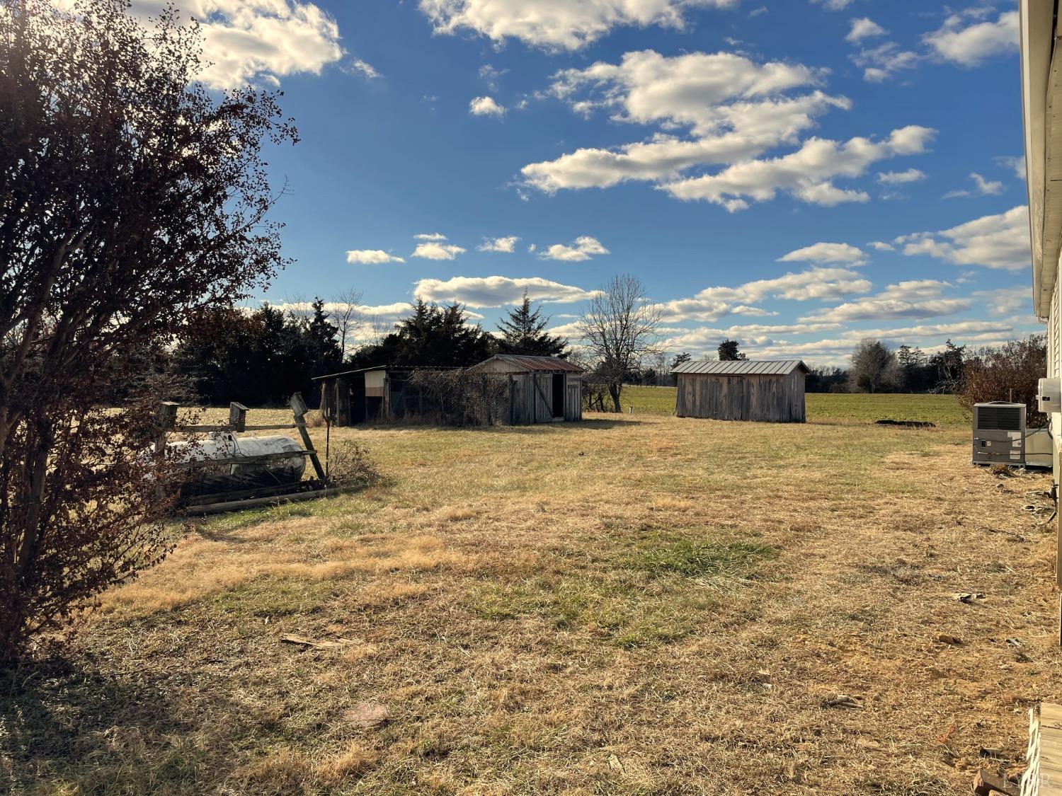 232 Camp Branch Road Gretna, VA 24557 - Photo 40 of 47 a view of a terrace with a barbeque