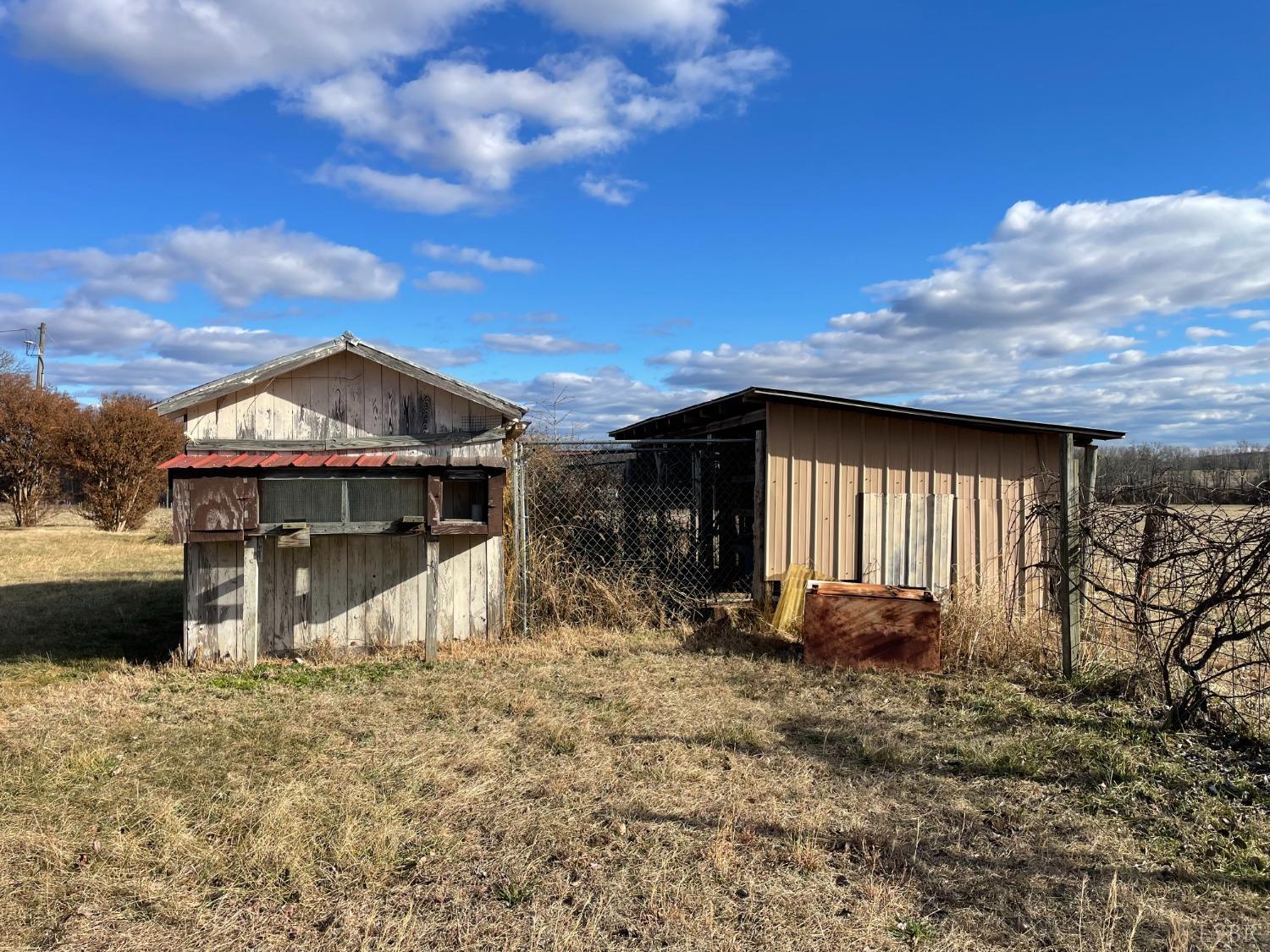 232 Camp Branch Road Gretna, VA 24557 - Photo 41 of 47 a front view of a house with garden