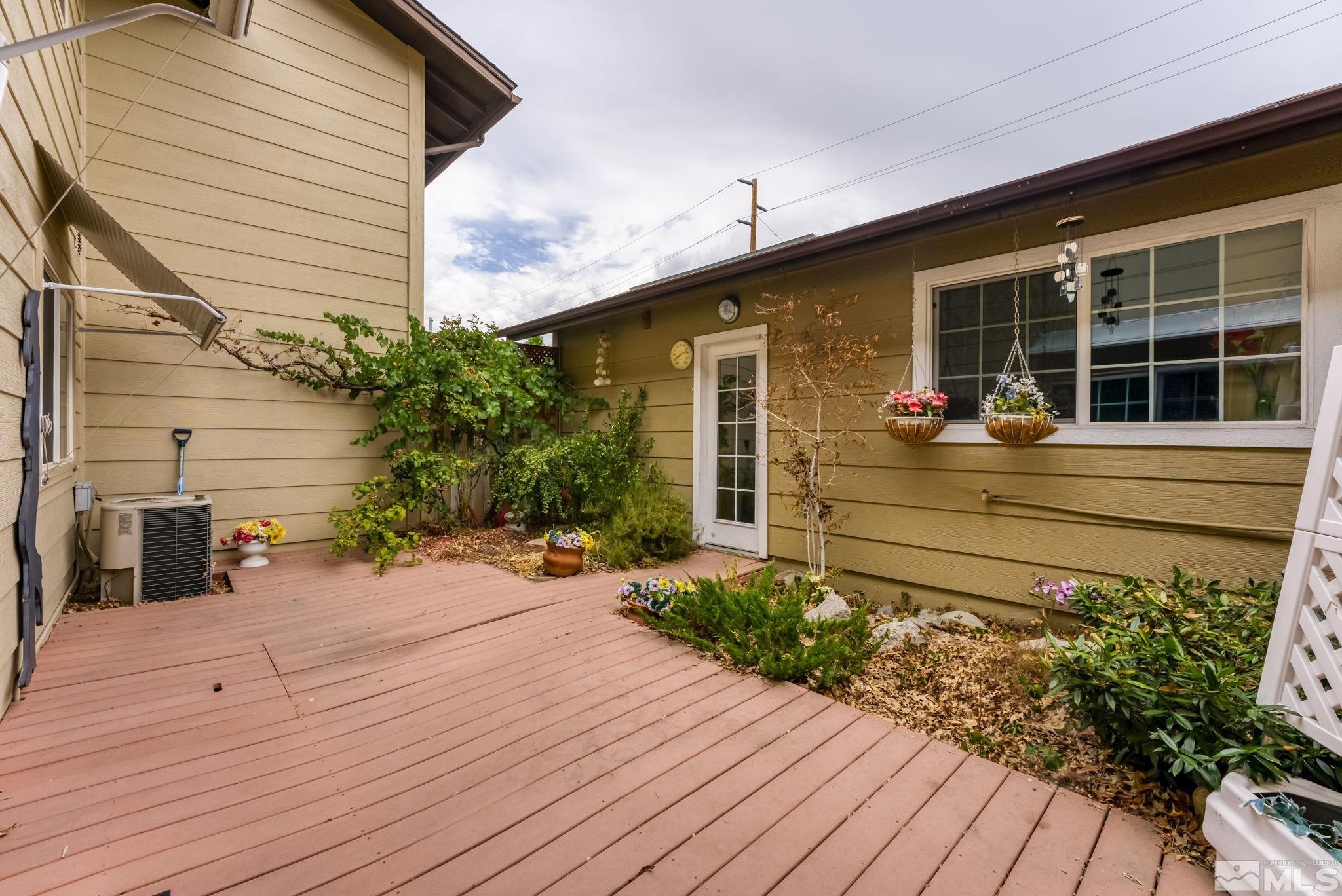 1407 Foster Drive Reno, NV 89509 - Photo 29 of 34 a front view of a house with a yard