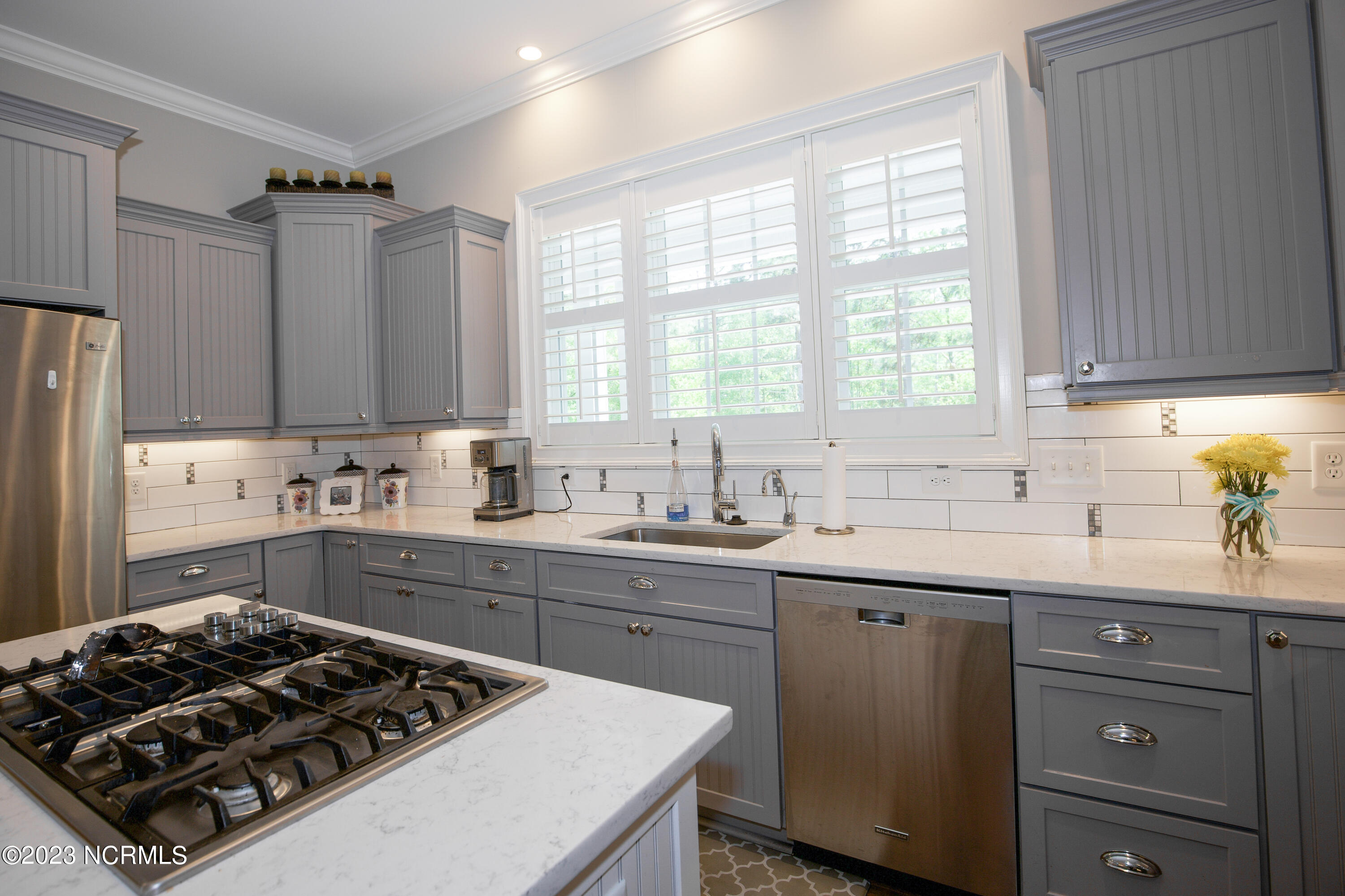 153 National Drive Pinehurst, NC 28374 - Photo 18 of 60 Sink with 3 windows overlooking driveway