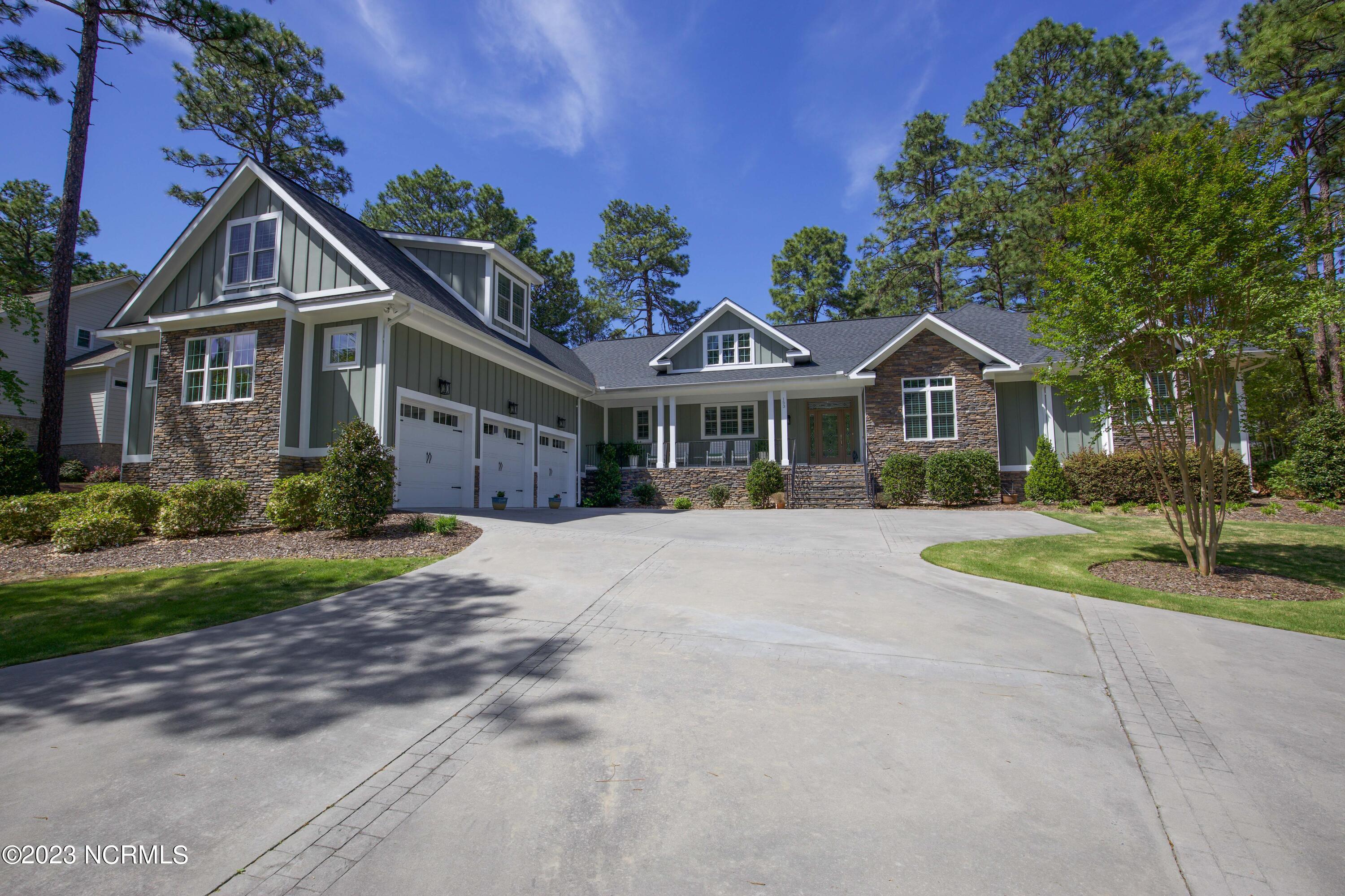 153 National Drive Pinehurst, NC 28374 - Photo 2 of 60 Front shot of driveway
