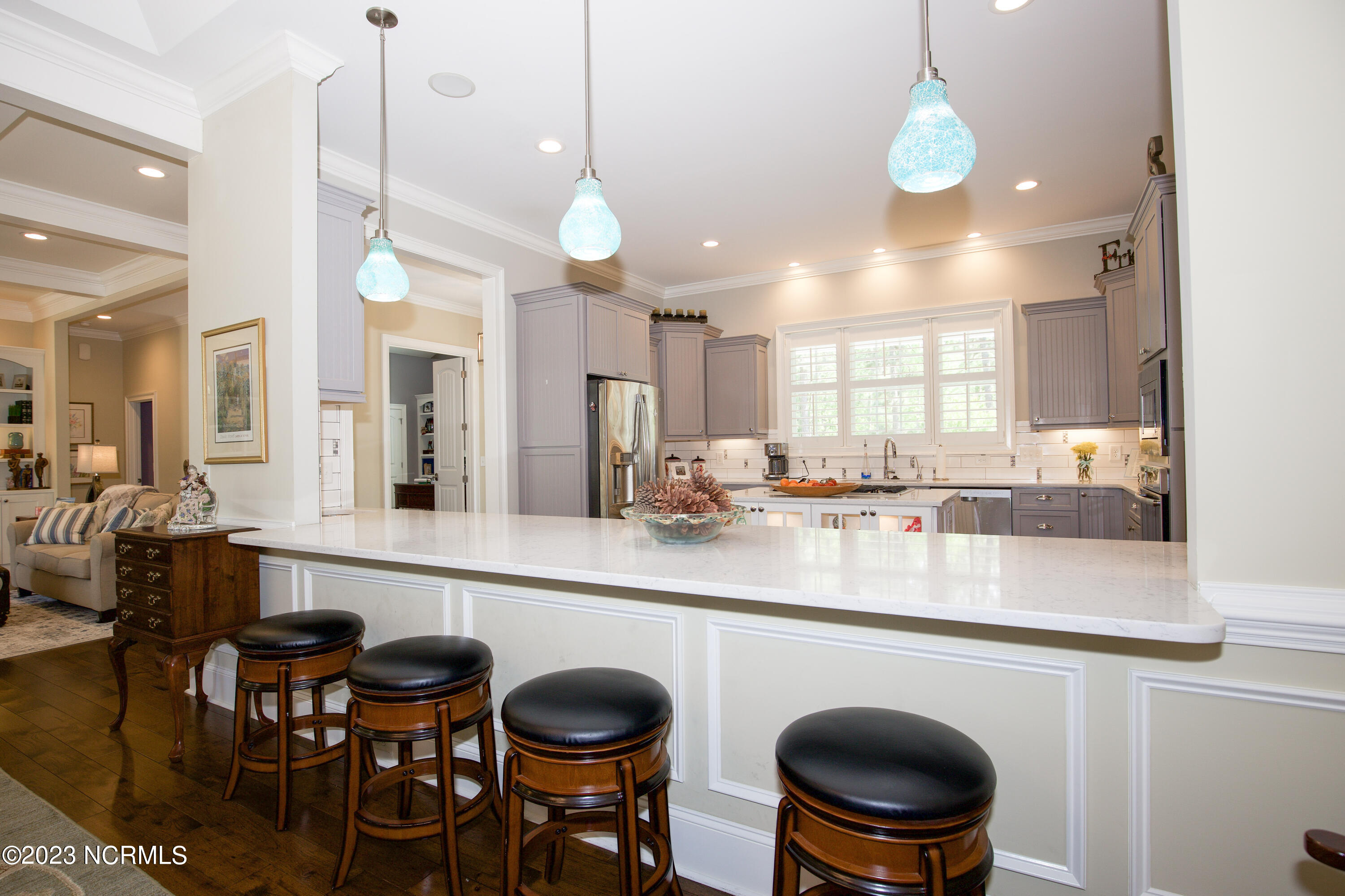 153 National Drive Pinehurst, NC 28374 - Photo 25 of 60 Extra seating for bar area between kitchen and dining