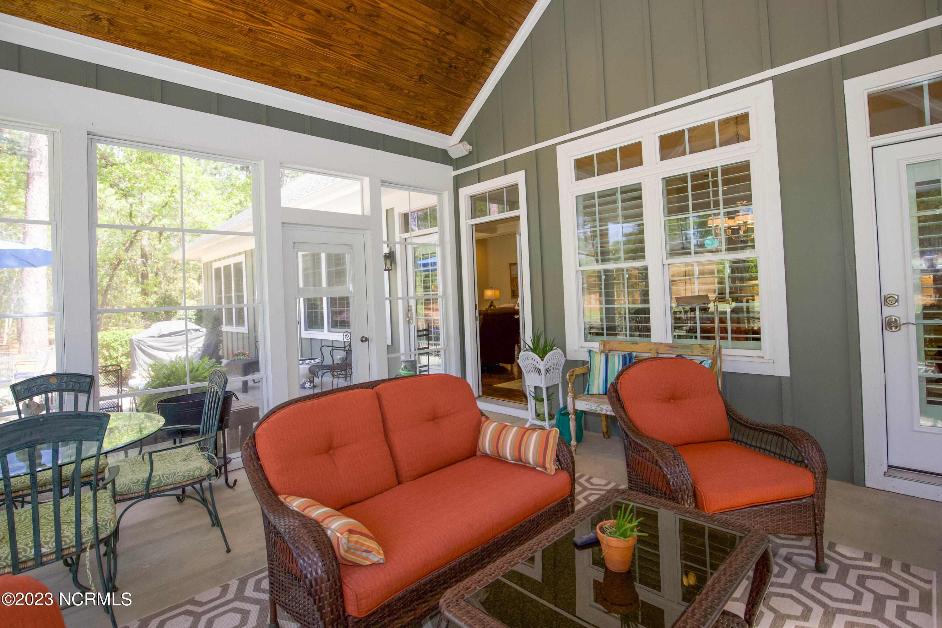 153 National Drive Pinehurst, NC 28374 - Photo 29 of 60 Sun room has access to back patio.