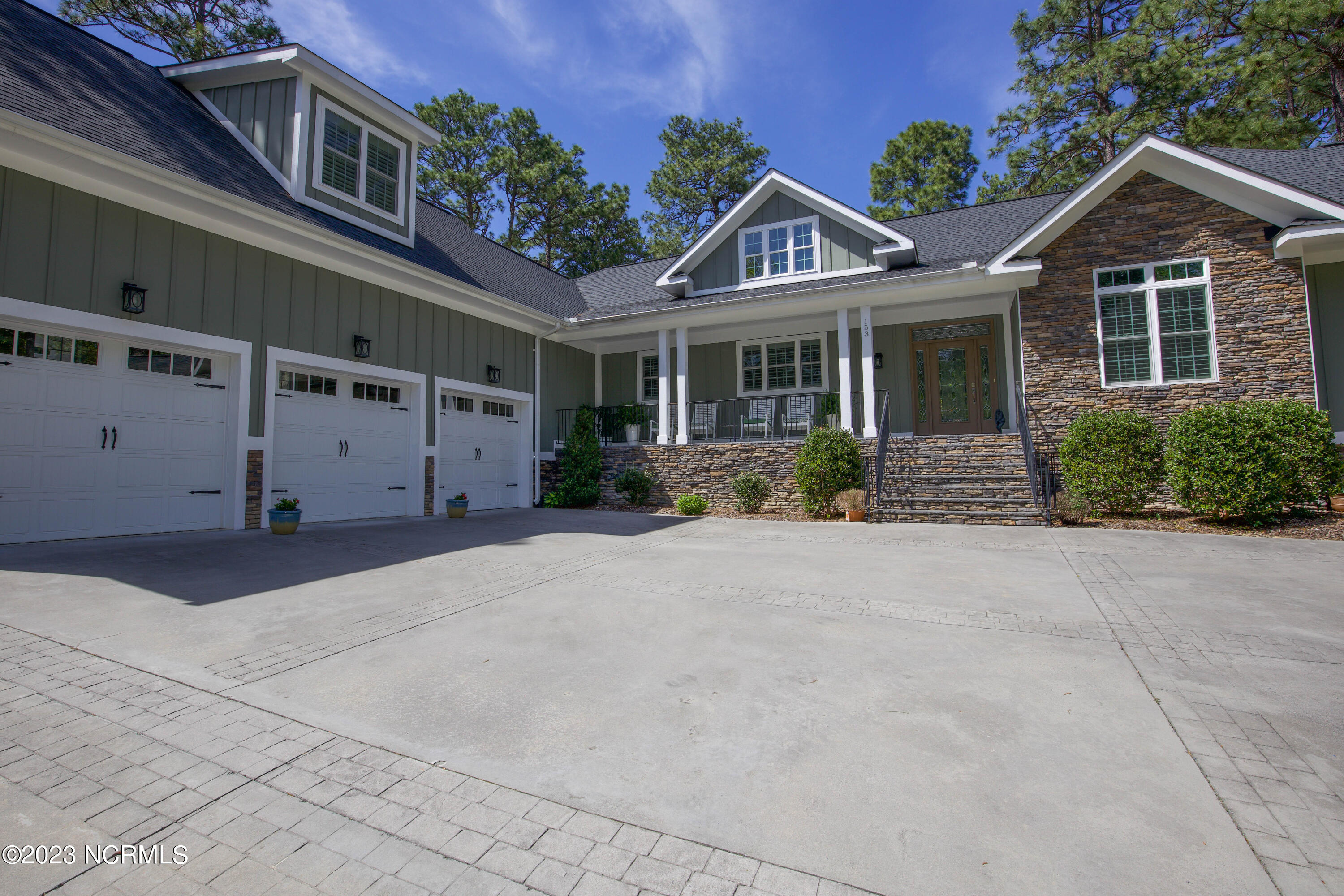 153 National Drive Pinehurst, NC 28374 - Photo 3 of 60 3 car garage.
