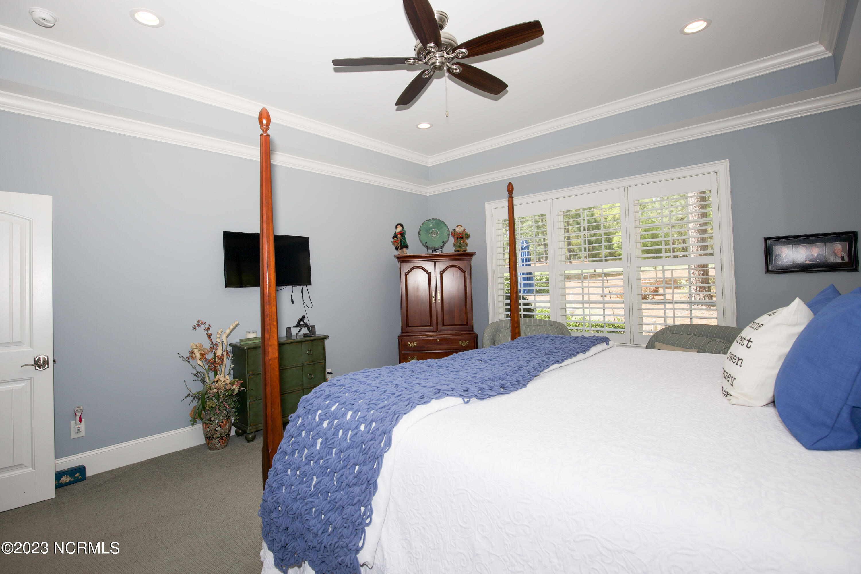 153 National Drive Pinehurst, NC 28374 - Photo 31 of 60 Main bedroom with 10 ft. tray ceiling