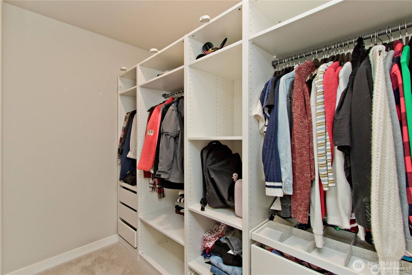 28252 33rd Place South Auburn, WA 98001 - Photo 24 of 33 a view of walk in closet with clothes and shoes
