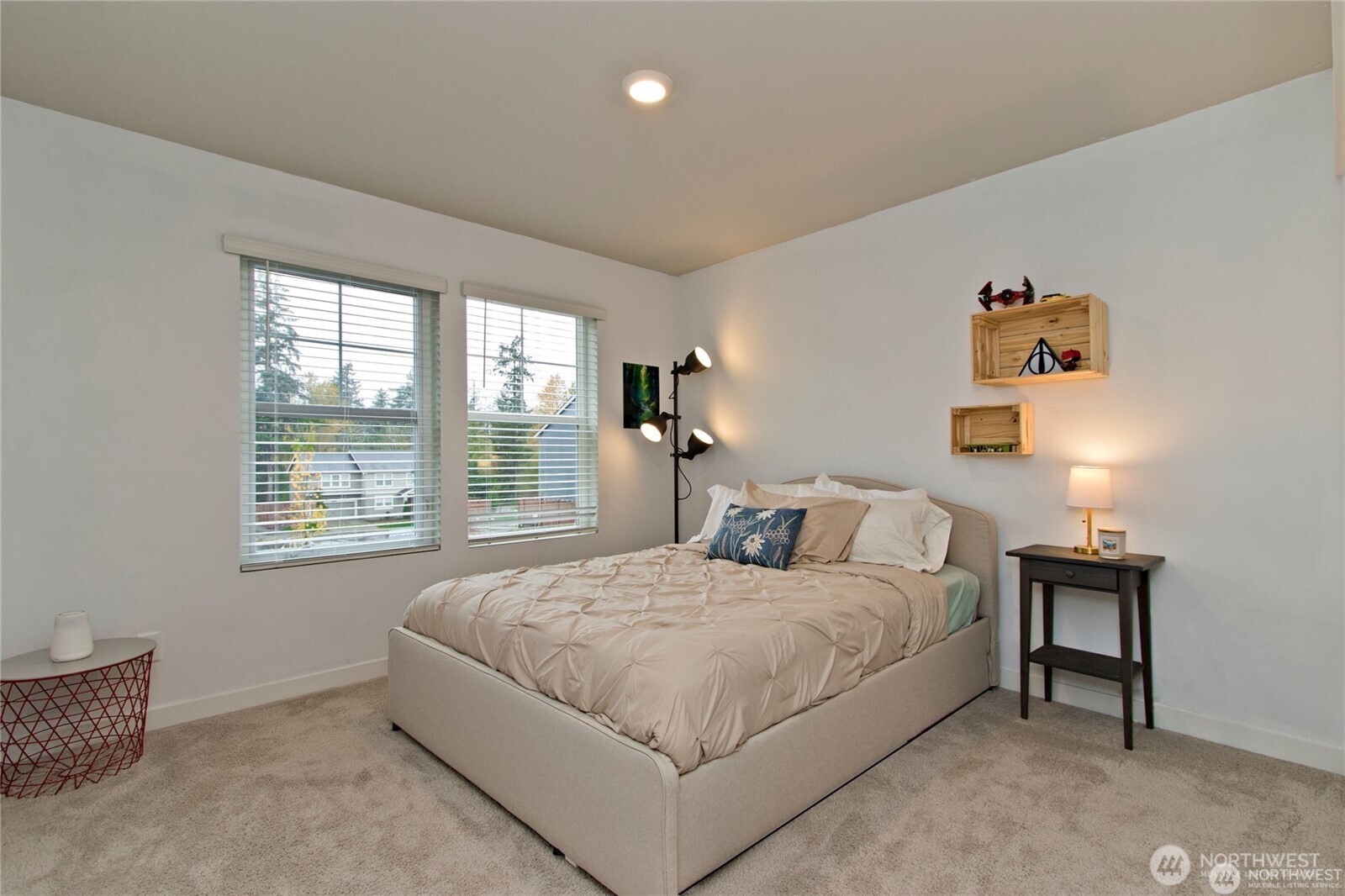 28252 33rd Place South Auburn, WA 98001 - Photo 25 of 33 a large bedroom with a bed and a lamp on table