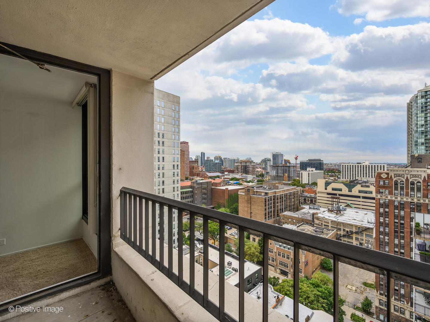 1030 North State Street, Unit 13A Chicago, IL 60610 - Photo 6 of 17 a view of a balcony with city view