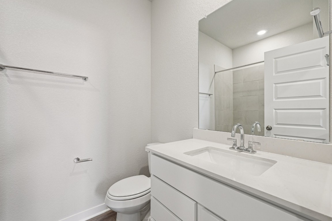 1216 Lavender Way Georgetown, TX 78628 - Photo 19 of 40 a bathroom with a sink toilet and shower