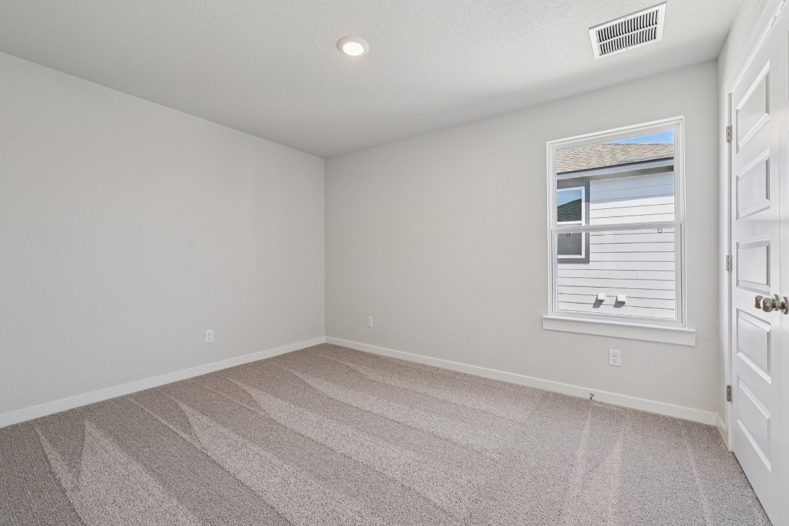 1216 Lavender Way Georgetown, TX 78628 - Photo 21 of 40 an empty room with a window